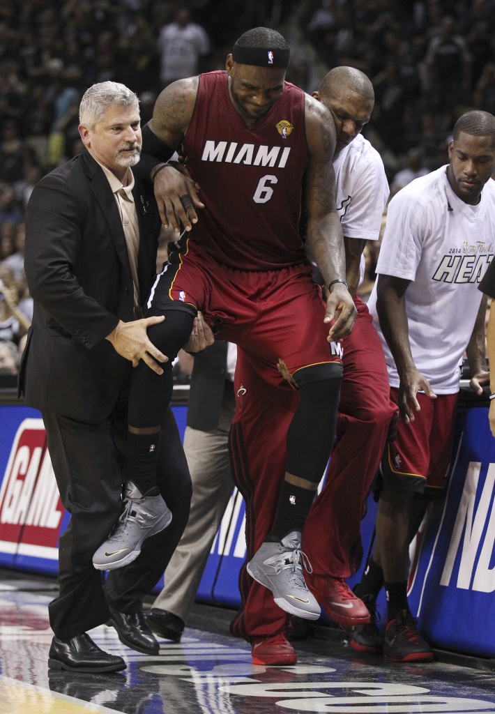 Lebron James' infamous Cramp Game jersey worn during Game 1 of the 2014  NBA Finals will be sold at Infinite Auctions!