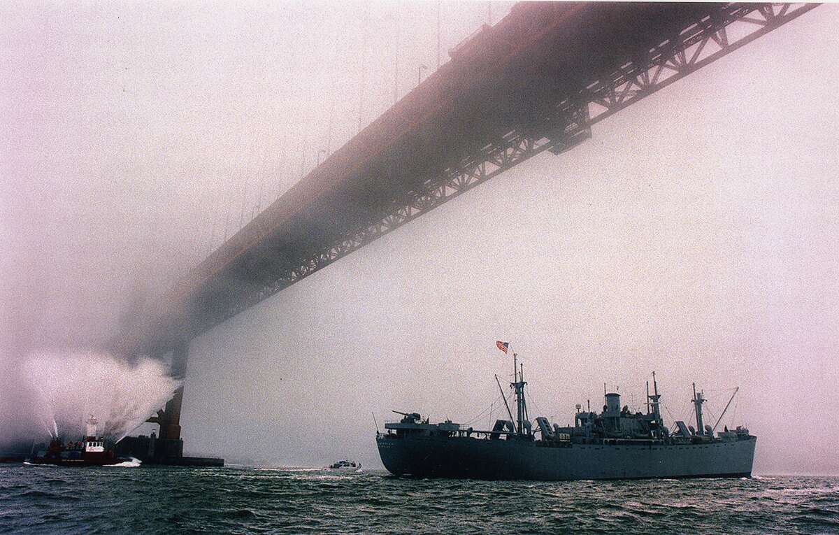The Jeremiah O'Brien passing under the Golden Gate Bridge on it's way to Europe. The Jeremiah O'Brien travelled from San Francisco to Europe in 1994 to join the 50th anniversary ceremonies for D-Day Photo ran 07/04/1995, P. E 7