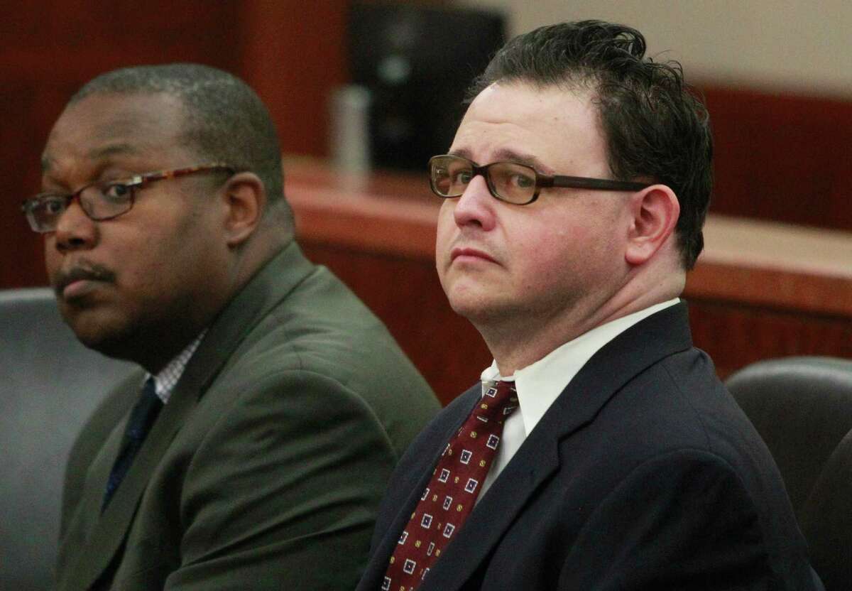 Attorney Eric Davis, left, shown with his client, Mark Castellano, who was going to appear on TV show "Dr. Phil" to talk about how his girlfriend allegedly left behind her two children before he confessed.