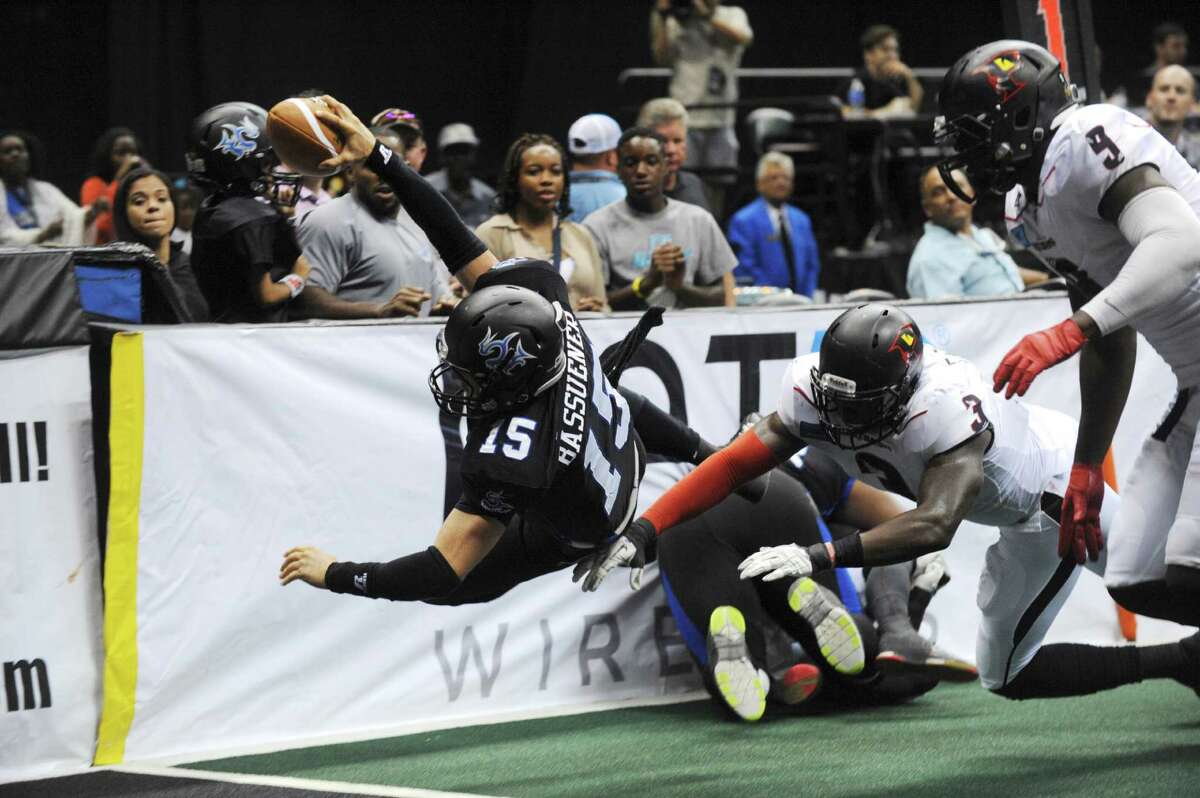 Matthew Bassuener of the San Antonio Talons dives for the goal line during Arena Football League action against the Orlando Predatorsin the Alamodome on Saturday, June 7, 2014. The play was called back because of a penalty.