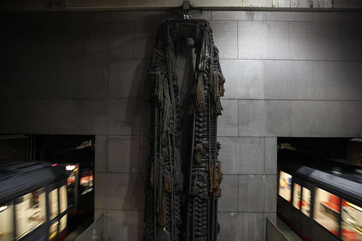 A macrame sculpture titled "Legs" by Barbara Shawcroft hangs at the east end of the Embarcadero BART station on Friday, April 26, 2013 in San Francisco, Calif.