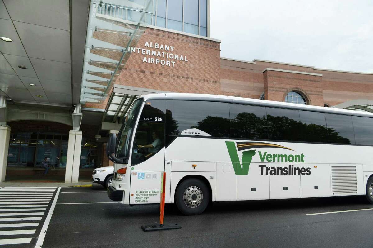 A Vermont Translines bus departs from Albany International Airport Monday afternoon, June 9, 2014, in Colonie, N.Y. Vermont Translines began daily bus service from the airport to Vermont destinations along Route 7 and, with transfer, Route 4. The daily bus also makes a stop at the Greyhound/Trailways terminal in Albany. The new routes are partially funded by the Vermont Agency for Transportation and the Federal Transit Administration. (Will Waldron/Times Union)
