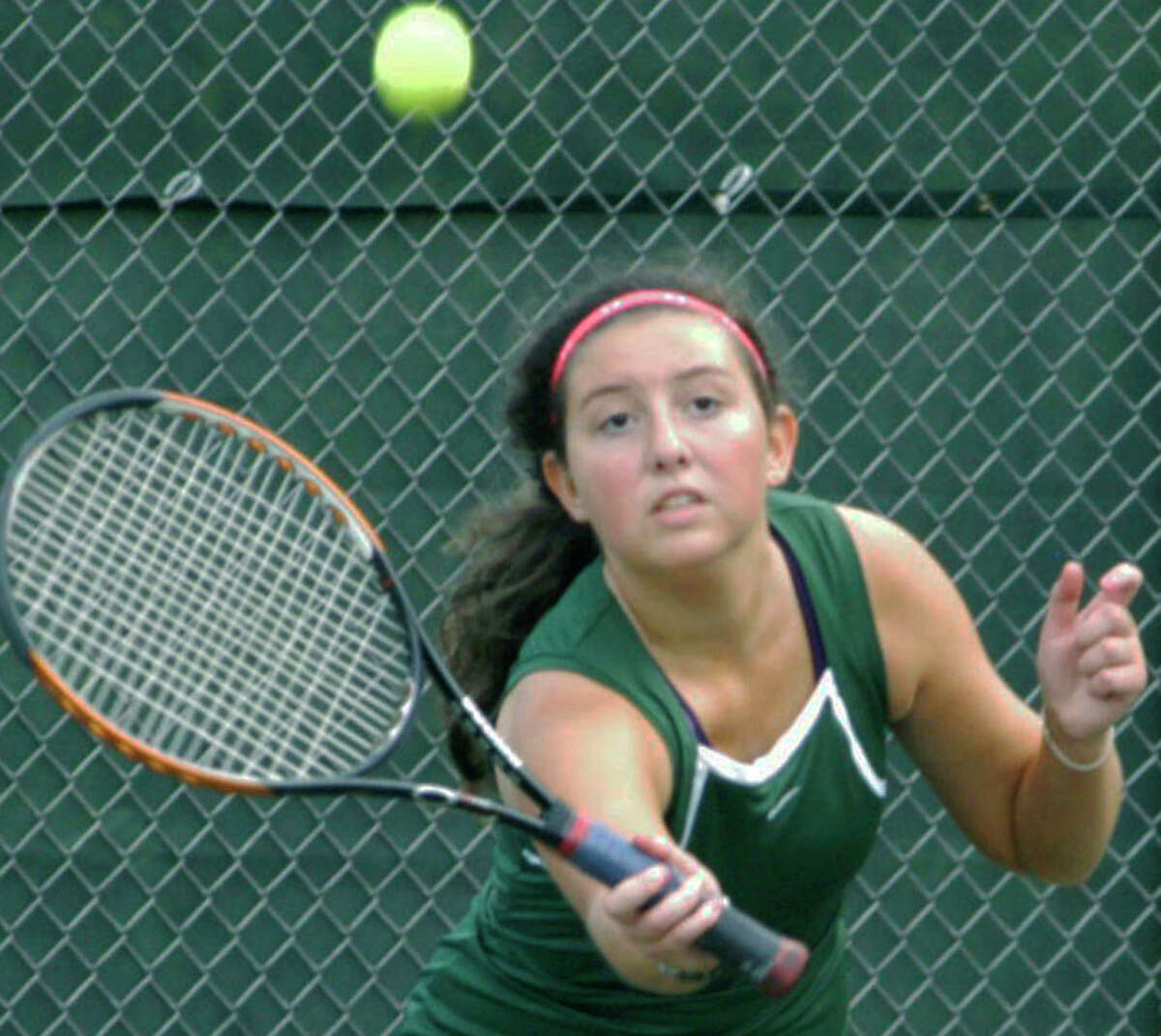 Anika Mirabito of the Green Wave focuses on the task at hand during New Milford High School girls' tennis' 4-3 victory over Immaculate, May 14, 2014 at NMHS.