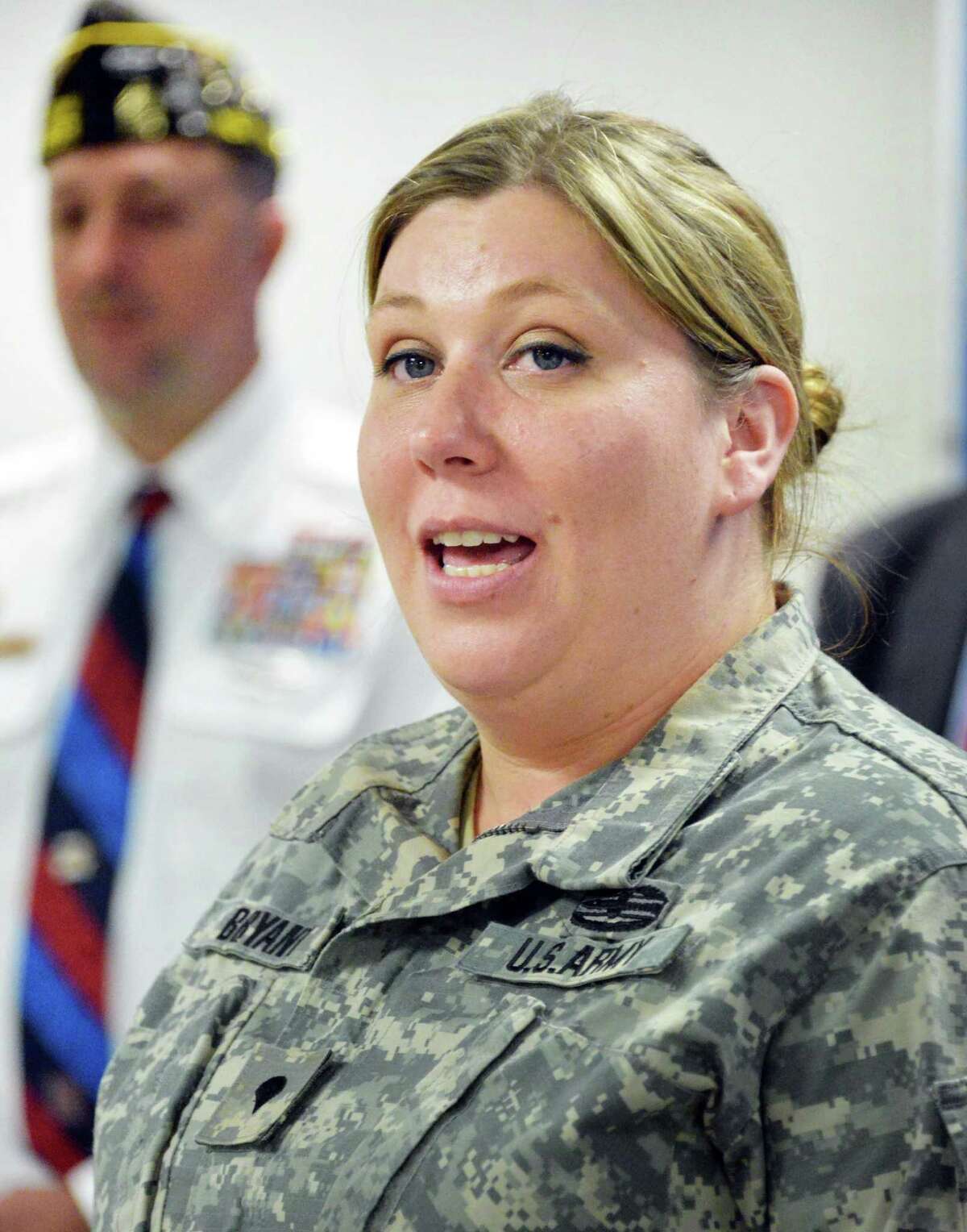 US Army MP Jennifer Nunnery of Batavia speaks during a news conference to urge legislators to pass a bill that helps veterans with mental health ailments in the criminal justice system Tuesday June 10, 2014, in Albany, NY. (John Carl D'Annibale / Times Union)