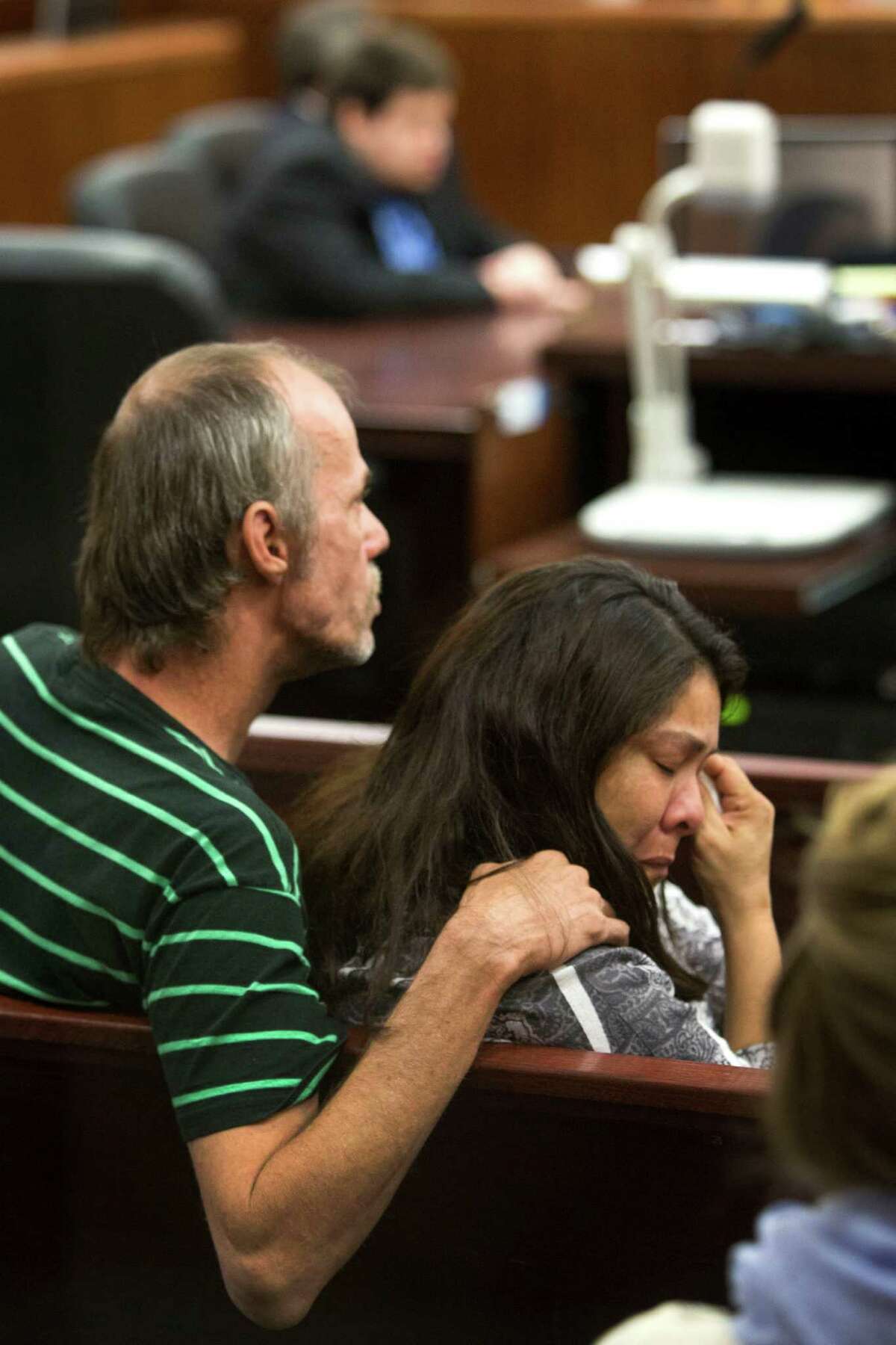 Monica Shiel, aunt of defendant, Justin Wayne Parris, 27, wipes a tear from her eye as she listens to testimony Tuesday.