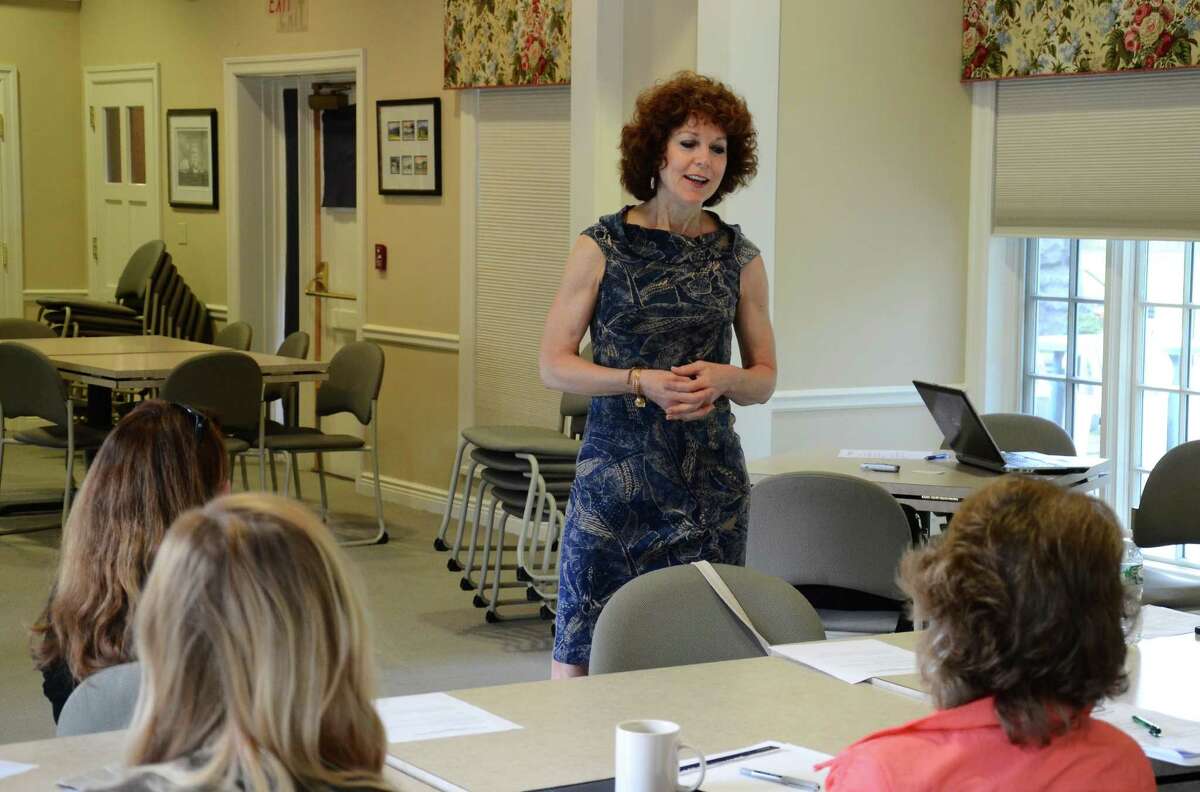 Jane Doe No More's founder Donna Palomba speaks at a New Canaan Domestic Violence Partnership meeting Wednesday, June 4, 2014, at the Lapham Community Center in New Canaan, Conn. Palomba survived a sexual assault in her own home in 1993.