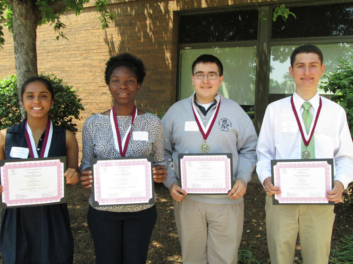 These students were among the 34 area high school juniors honored by Fairfield University and Sikorsky for achievement in math and science. From left to right: Hansini Bhasker, from Greenwich High School; Doris Boursiquot, from Stamford High School, Stamford; Robert Mancini, from Immaculate High School in Danbury; and Ryan Wolfe, from Trinity Catholic High School in Stamford.