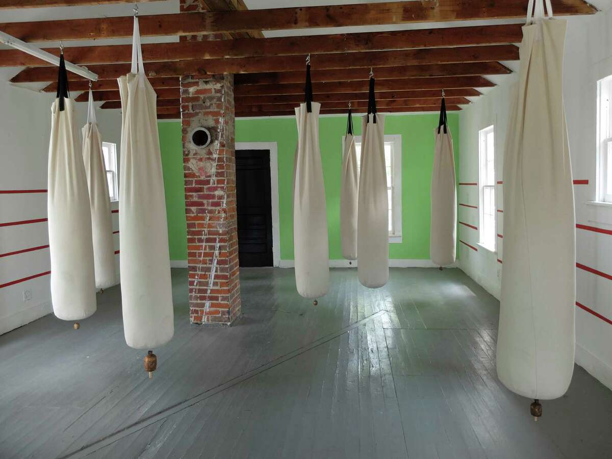 A view of the "Progressive Amateur Boxing Association" installation at Project Row Houses, part of Round 40 by Otabenga Jones & Associates.