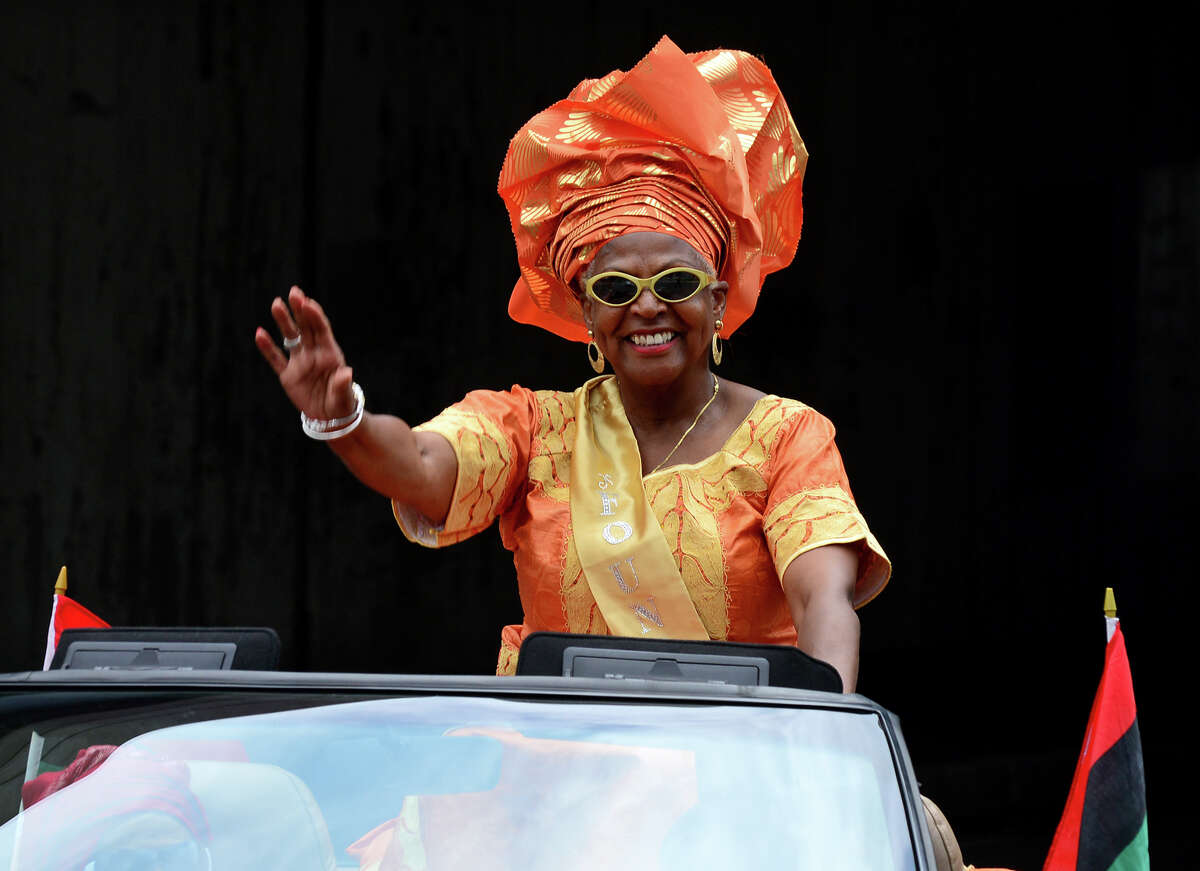 Cynthia Griffin, Founder of the Annual Juneteenth African-American Caribbean Freedom Day Parade, rides along in the parade route in downtown Bridgeport, Conn. on Saturday June 14, 2014.