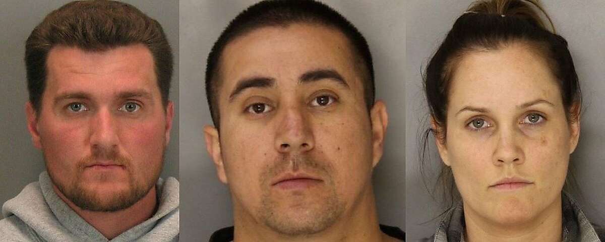 Police say, from left, Semir Metovic, Tito Hernandez, and Abby Rose were arrested with more than 800 marijuana plants, weapons, and narcotics in a massive operation in Mountain View and San Jose on Saturday, June 14, 2014.