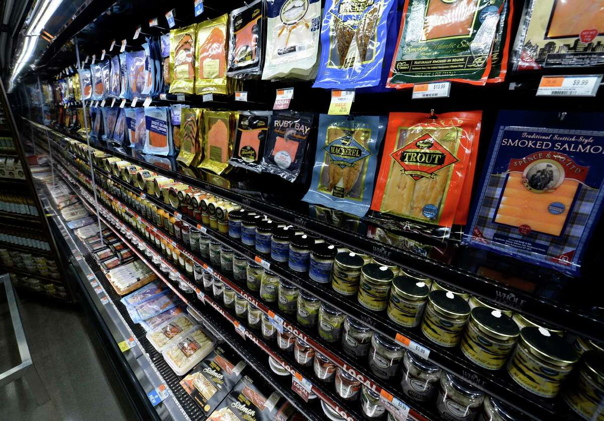 Packaged fish products are lined up for sale at the new Whole Foods market store Monday morning, June 16, 2014, as the store gets ready for the grand opening on Wednesday at Colonie Center in Colonie, N.Y. (Skip Dickstein / Times Union)