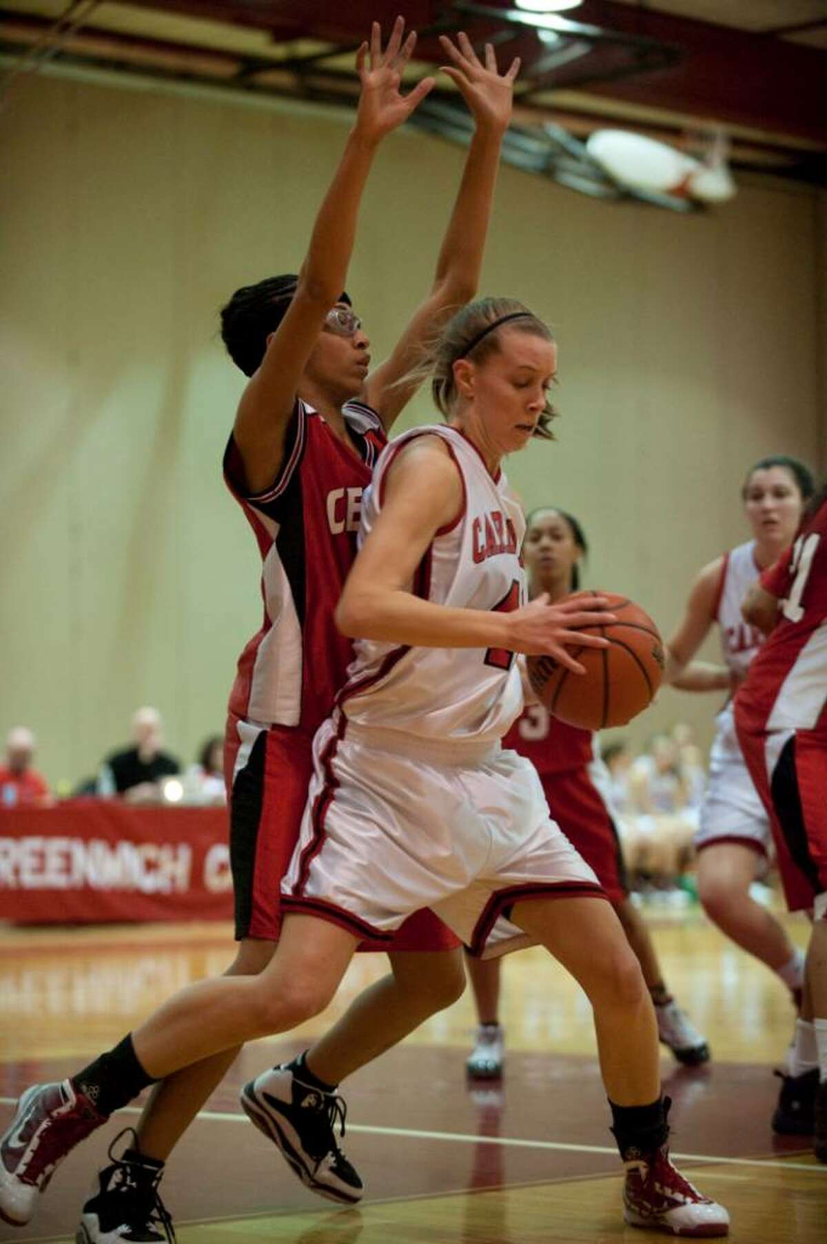 Central's Phylllisse Lewis guards Erin Laney of Greenwich High girls basketball Monday Feb. 15, 2010.