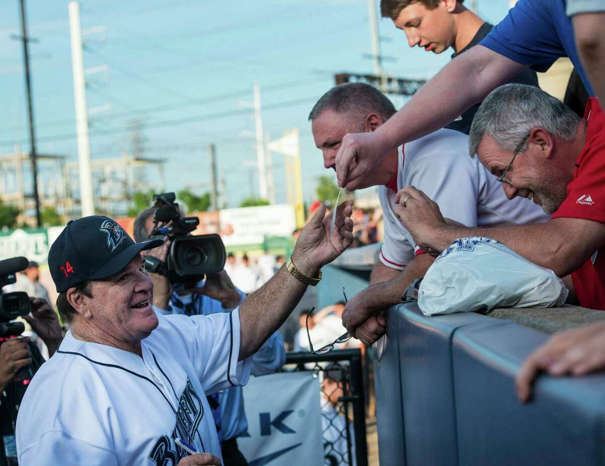 Pete Rose manager of the Bridgeport Bluefish for a game signs autographs for some of the fans prior to a game against the Lancaster Barnstormers at the Ballpark at Harbor Yard on Monday, June 16th, 2014