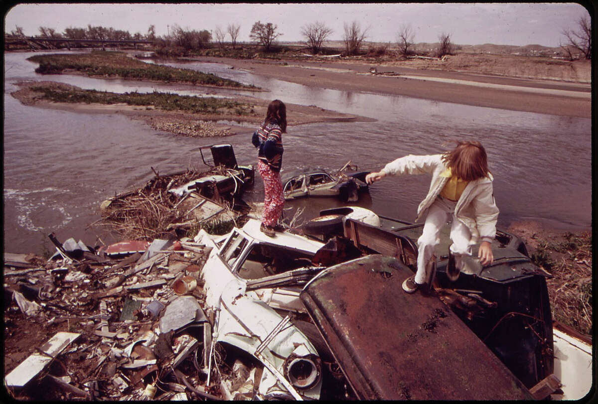 Communities must be vigilant about plans to site incinerators, landfills, waste transfer stations, sewage treatment plants or other toxic facilities nearby where they might threaten the health of residents. Above, unwitting children play at a local waste dump. Photo courtesy of Bruce McAllister