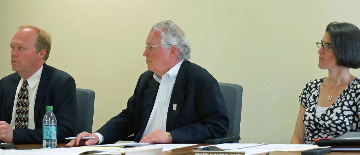 The Board of Selectmen Wednesday approved raises for 14 of the town's 15 department heads.