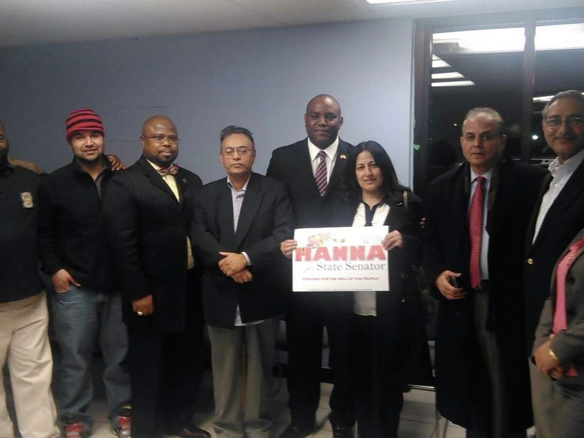 Hanna, pictured at a fundraiser in Northwest Baltimore, with supporters.