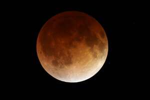 Near-total lunar eclipse to occur this week. Will Seattle see it?