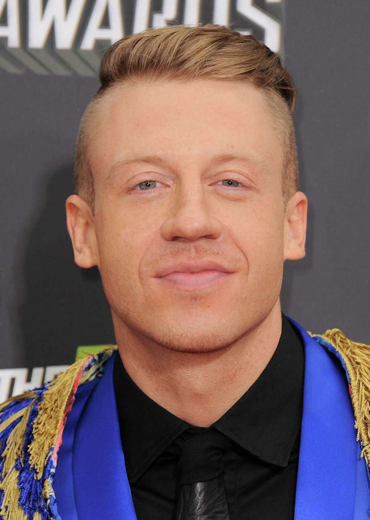 Macklemore arrives at the MTV Movie Awards in Sony Pictures Studio Lot in Culver City, Calif., on Sunday April 14, 2013. (Photo by Jordan Strauss/Invision/AP)