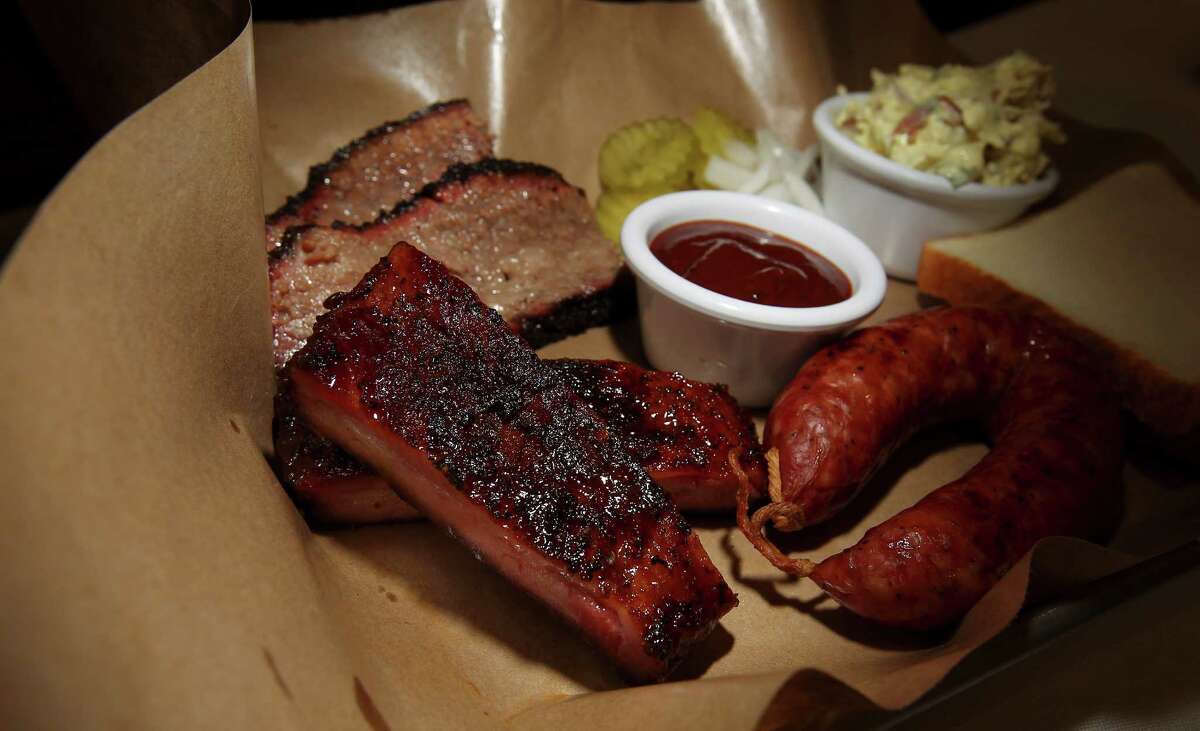Sample of a barbecue plate from H-E-B's Market at Stone Oak's restaurant, Oaks Crossing, on Thursday, June 19, 2014. The new store features an extensive beer and wine section, a charcuterie and a full service restaurant and bar.