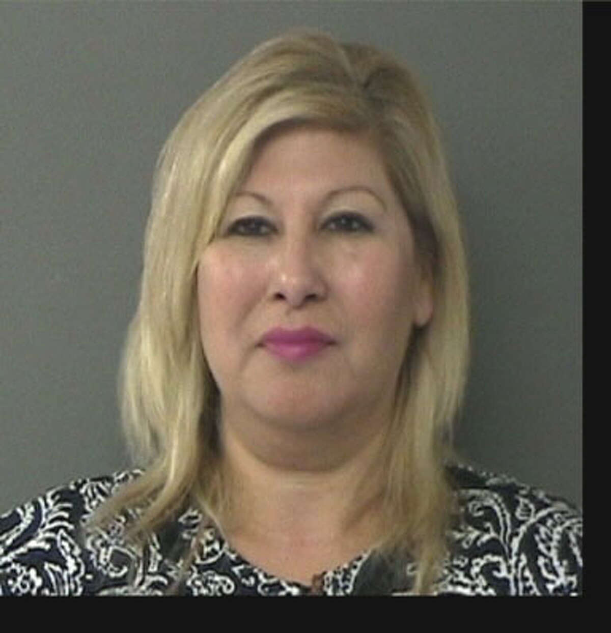 Delma Flores-Smith turned herself in at the Waller County Jail.