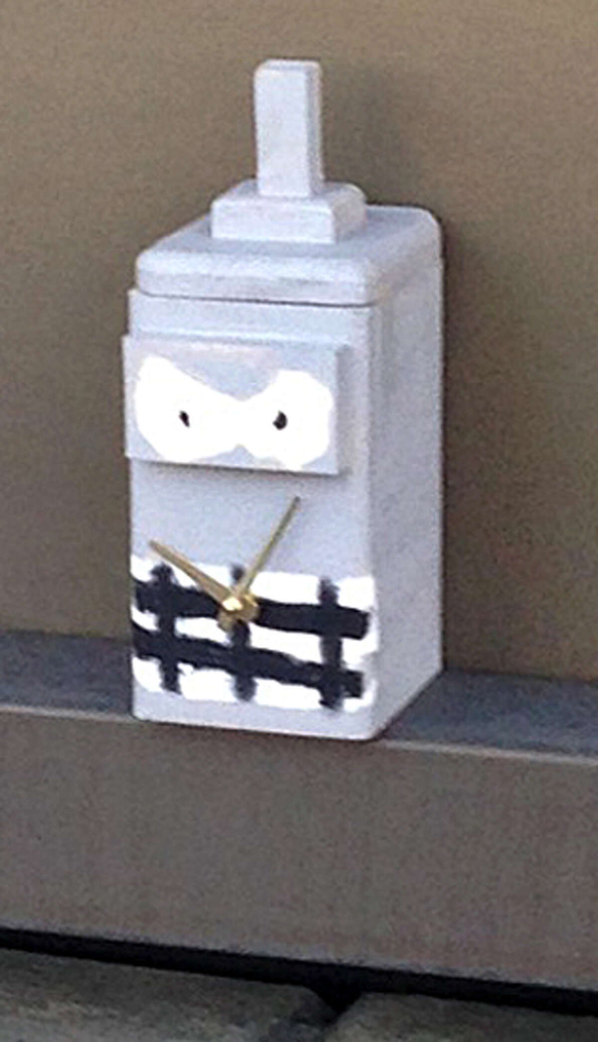 This suspicious box with a smiling face and clock hands discovered on the Unquowa Road overpass near the railroad tracks in Fairfield Conn. caused Metro-North to shut down service in the area, resulting in hours of delays on the New Haven Line on Friday, June 20, 2014. The box was determined to not be a bomb, but a student project.