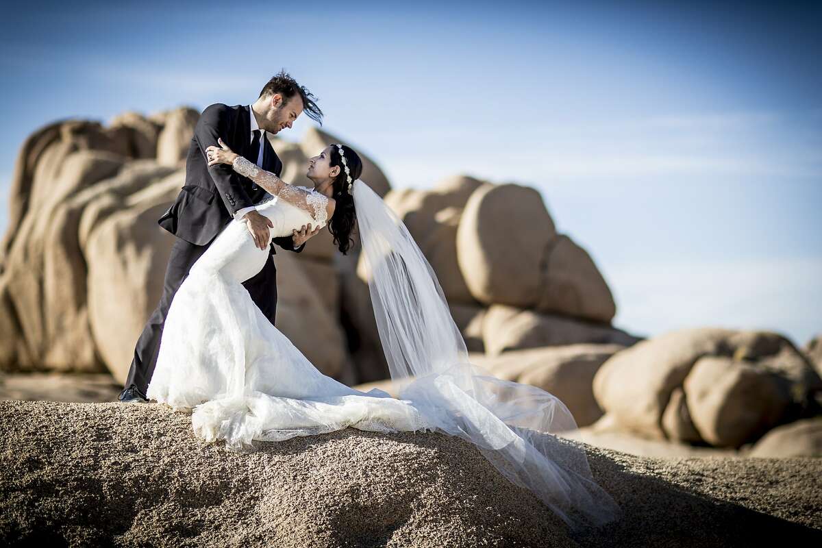 Paulette Harutnian and Mark Emerson of San Mateo, who both work in film in the Bay Area, wed April 25 in Southern California. After the wedding, the two embarked on a four-day trip with their wedding photographer, Cristiano Ostinelli, which included a stop at the Ivanpah Solar Power Facility in the Mojave Desert.