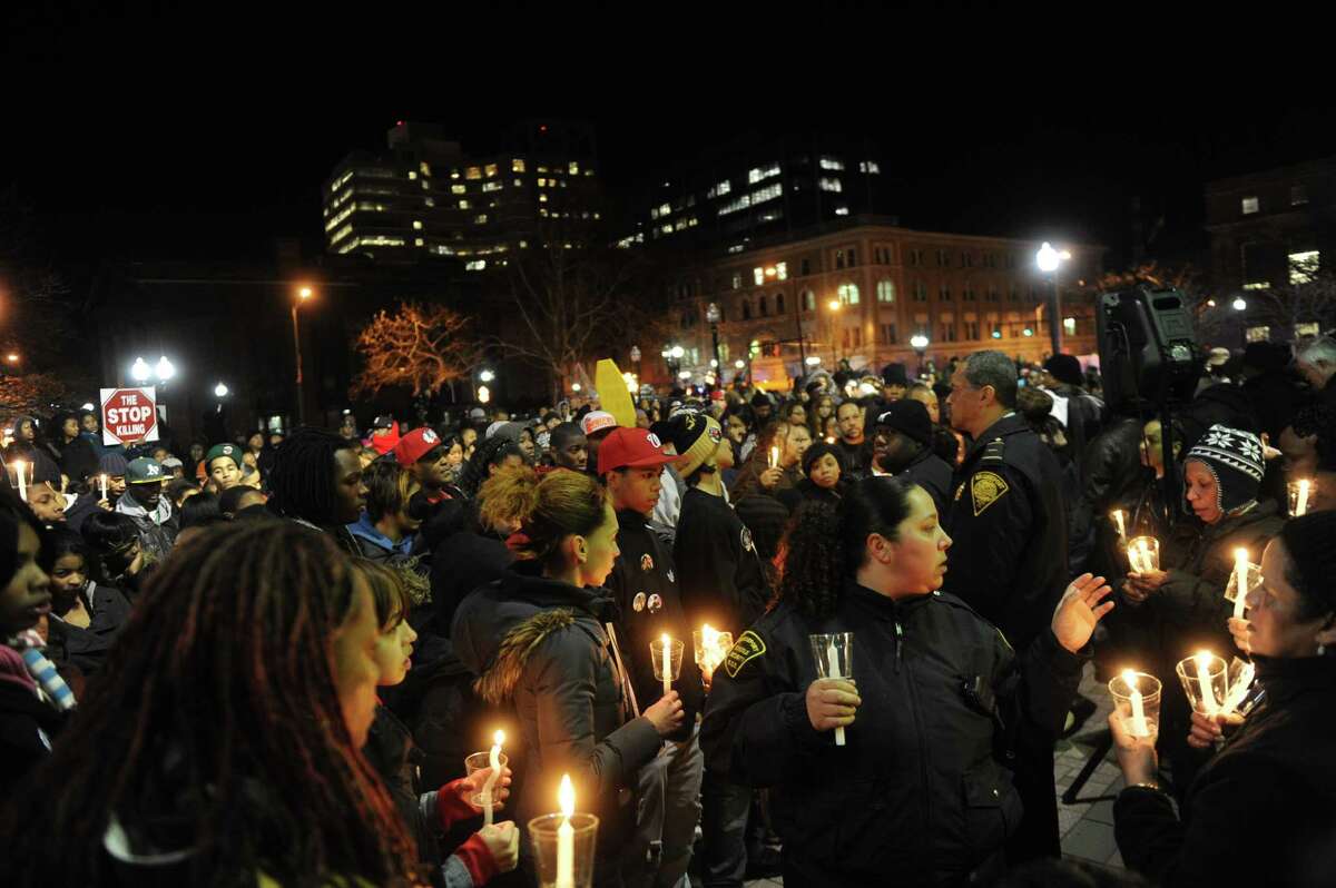 Hundreds of Bridgeport residents participate in an anti-violence rally Wednesday, Jan. 11. 2012 in response to the shooting of 14-year-old Justin Thompson.