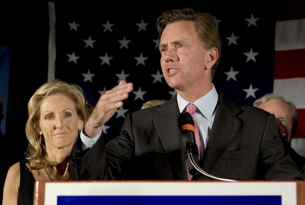 MERIDEN, CT - NOVEMBER 7: Democratic candidate Ned Lamont, along with his wife Annie concedes to incumbent Sen. Joseph I. Lieberman (D-CT) at the Sheraton Four Points Hotel November 7, 2006 in Meriden, Connecticut. In a highly divisive campaign, Lamont ran against Lieberman, a three-term Democratic incumbent who lost the party primary in August forcing him to run as an independent. (Photo by Bob Falcetti/Getty Images)