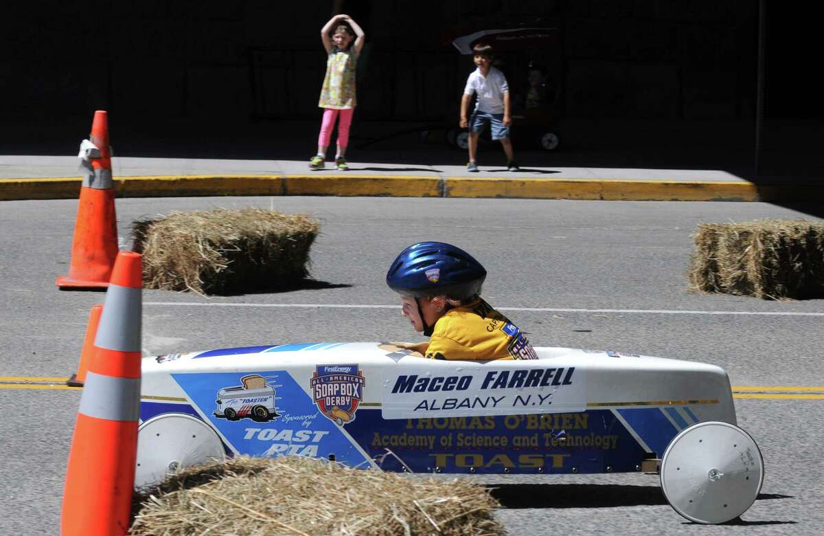 Maceo Farrell speeds to the finishline during Soap Box Derby racing on Saturday June 21, 2014 in Albany, N.Y. (Michael P. Farrell/Times Union)