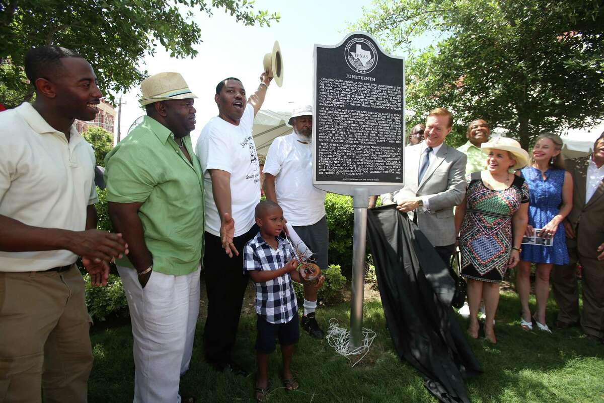 To cheers and smiles, the Juneteenth Historical Marker is unveiled Saturday, after a dedication ceremony hosted by the Galveston Historical Foundation and Texas Historical Commission, on the spot where the original announcement of emancipation was made.