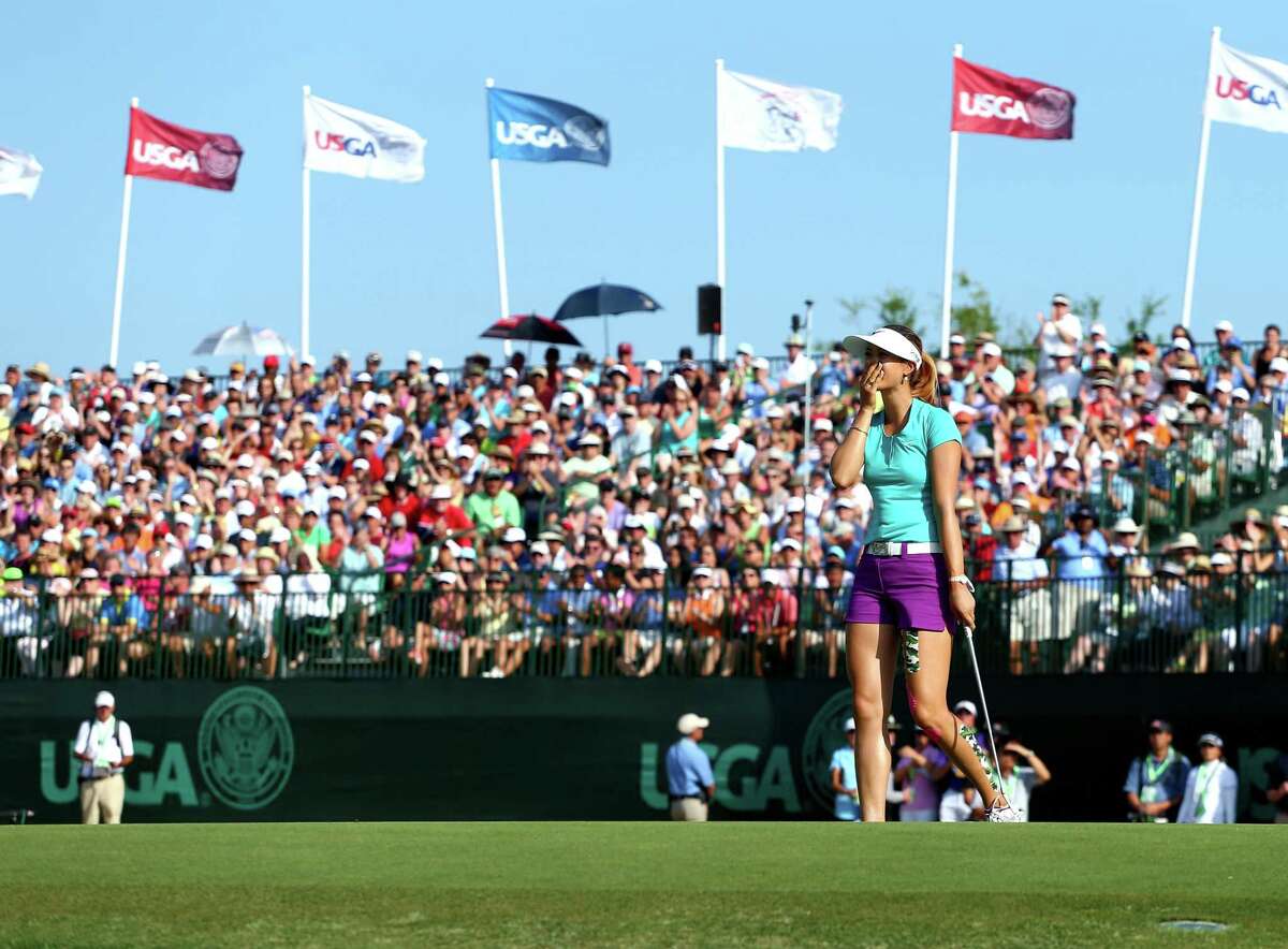 PINEHURST, NC - JUNE 22: Michelle Wie of the United States celebrates her two shot victory during the final round of the 69th U.S. Women's Open at Pinehurst Resort & Country Club, Course No. 2 on June 22, 2014 in Pinehurst, North Carolina. (Photo by Streeter Lecka/Getty Images)