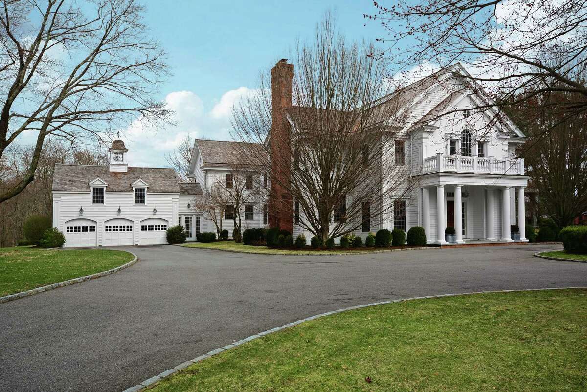 The Georgian Colonial Revival at 487 West Road in New Canaan offers more than 10,000 square feet of living space. It is on the market for $4,995,000.