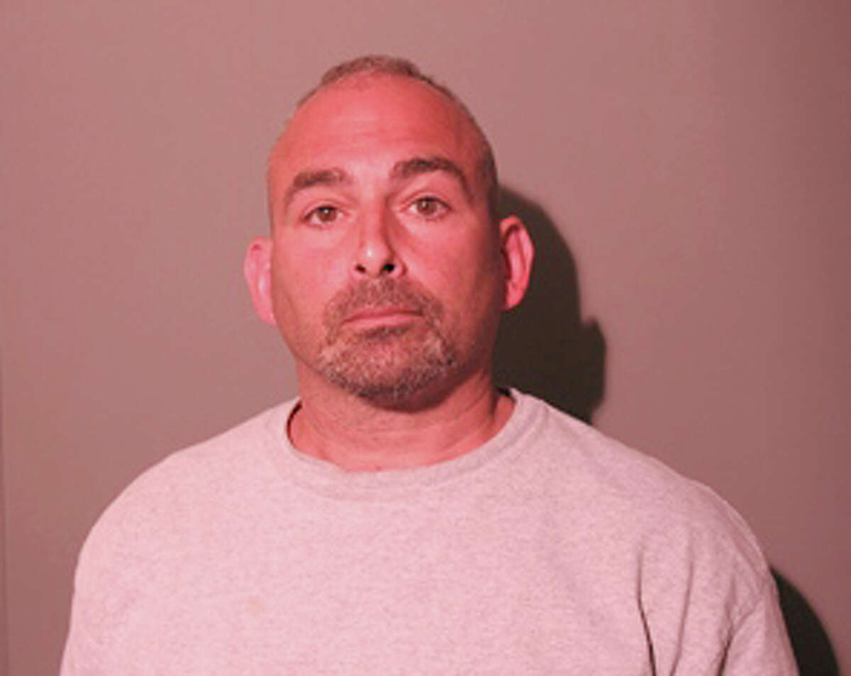 New Canaan Police arrested Mario J. Pizighelli III, 50, of Newtown, Conn., June 10, 2014, on a charge of first-degree larceny for the alleged theft of a $40,000 diamond.