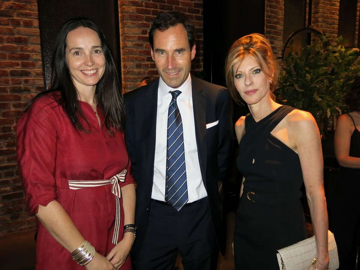 Square CFO Sarah Friar (left) with Elle Publisher Kevin O'Malley and Editor-in-Chief Robbie Myers at Quince Restaurant. June 2014. By Catherine Bigelow.