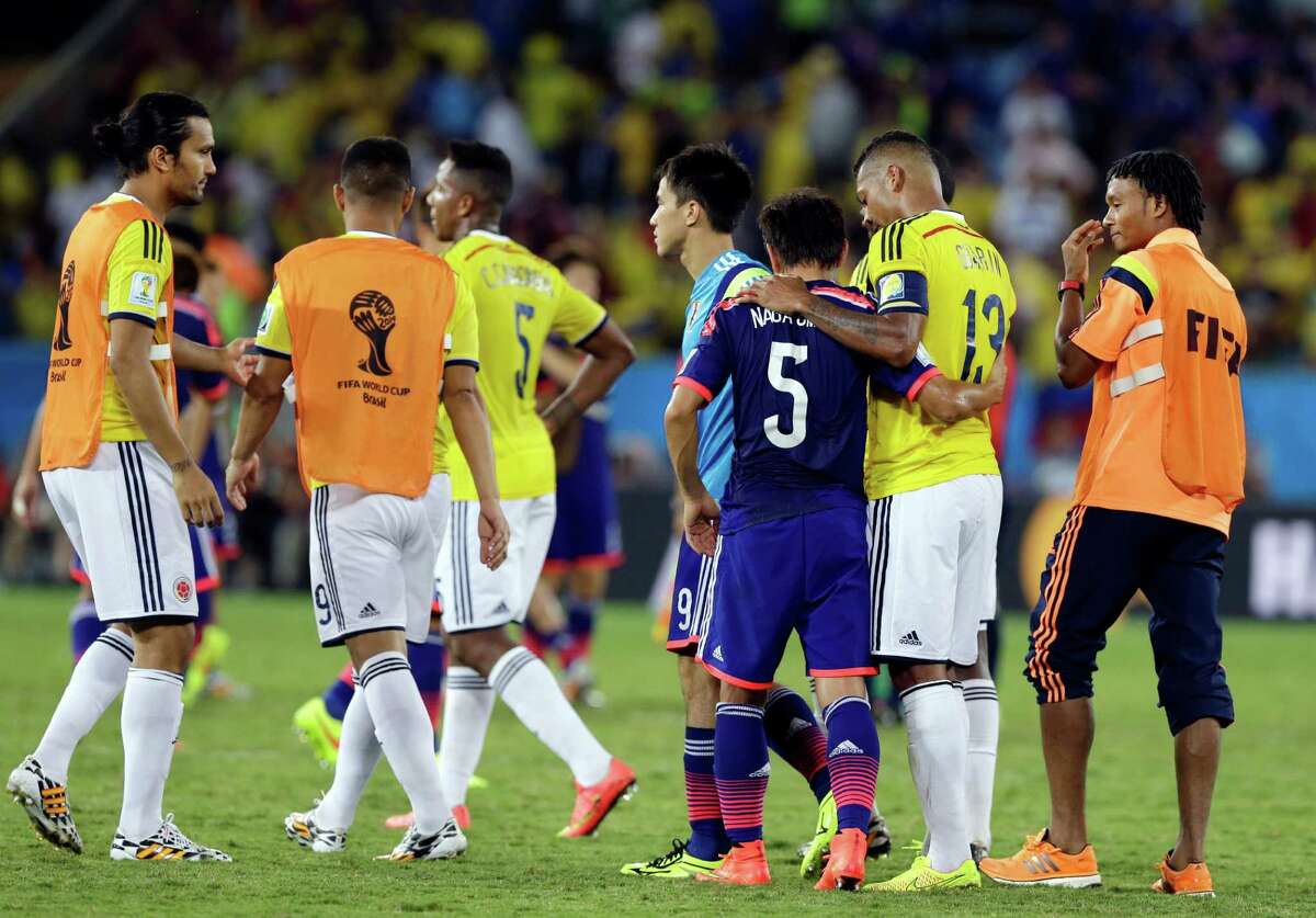 World Cup: Colombia tops Group C by beating Japan 4-1