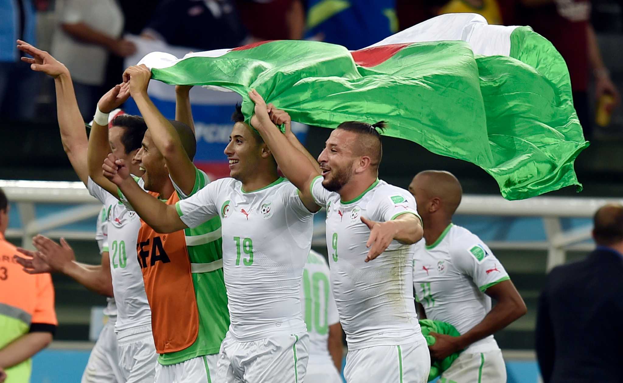 Algeria into 2nd round after 11 draw with Russia