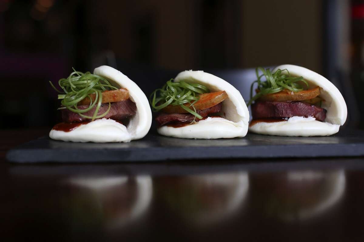 The steamed pork buns are available during happy hour at Umai Mi.