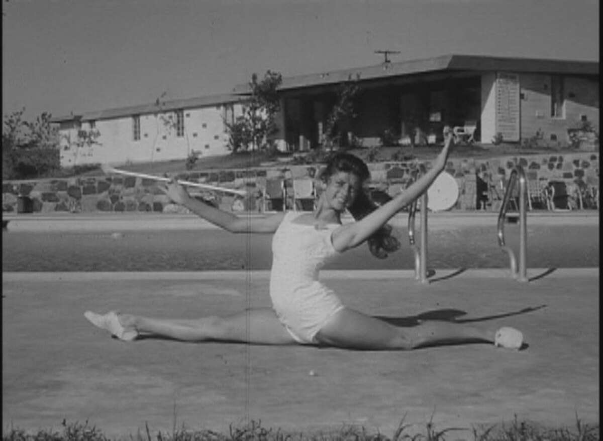 The mystery footage shows an apparent 1950s baton twirling summer camp with champion twirlers from across the state.