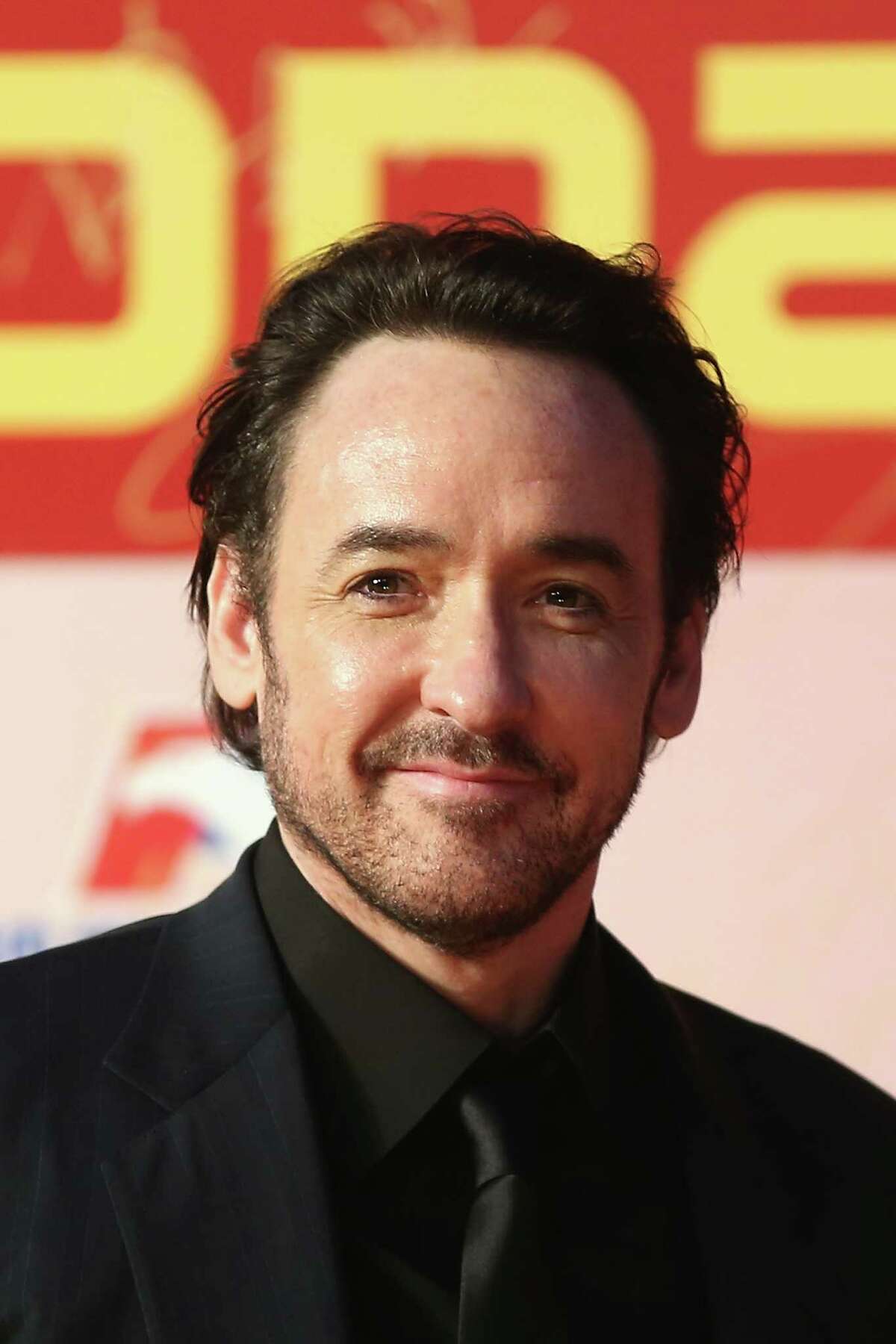SHANGHAI, CHINA - JUNE 14: Actor John Cusack arrives for the red carpet of the 17th Shanghai International Film Festival at Shanghai Grand Theatre on June 14, 2014 in Shanghai, China. (Photo by Feng Li/Getty Images)