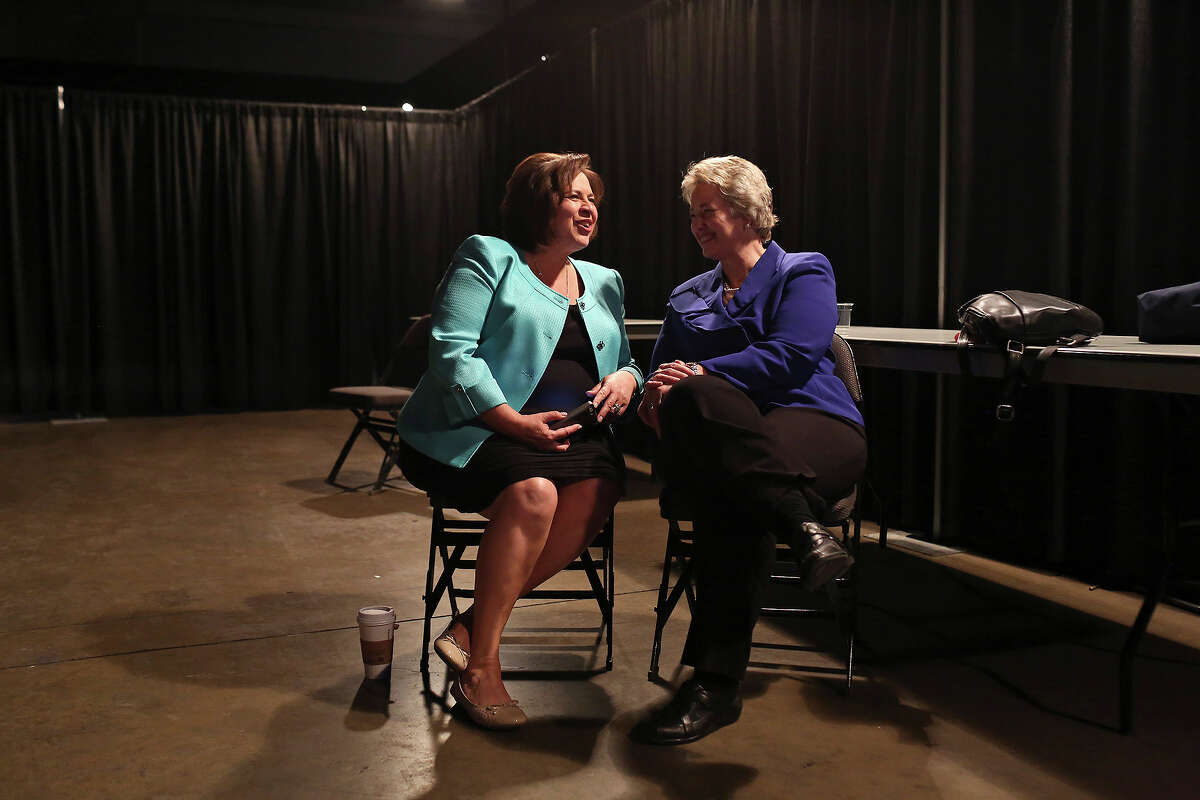 Leticia Van de Putte, State Senator and candidate for Lt. Governor, talks with Annise D. Parker, Mayor of Houston, backstage as they wait to speak to the Stonewall Democrats Caucus during the Texas Democratic State Convention at the Dallas Convention Center in Dallas on Friday, June 27, 2014.