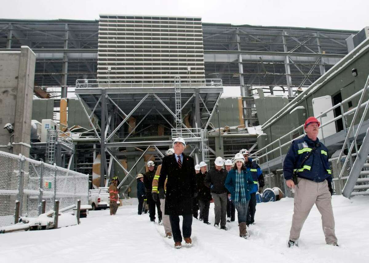 Sen. Christopher Dodd, D-Conn, left, and a group of officials tour the Kleen Energy Plant in Middletown, Conn., on Tuesday, Feb. 16, 2010. Dodd toured the Kleen Energy plant, where five people died in an explosion in Middletown, Conn., on Sunday, Feb. 7, 2010. (AP Photo/Thomas Cain)