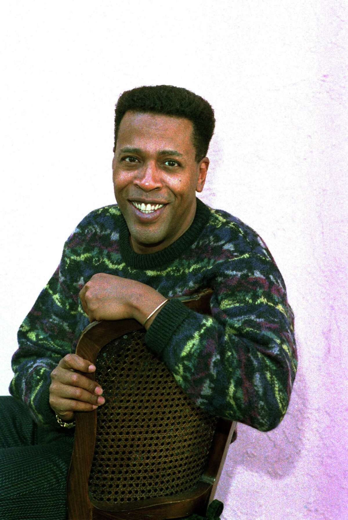 FILE - In this Jan. 30, 1989 file photo, actor Meshach Taylor poses during an interview in Los Angeles, Calif. Taylor's agent says the actor, who appeared in the hit sitcoms "Designing Women" and "Dave's World" died of cancer on Saturday, June 28, 2014, at his home in Los Angeles. He was 67. (AP Photo/Nick Ut, File)