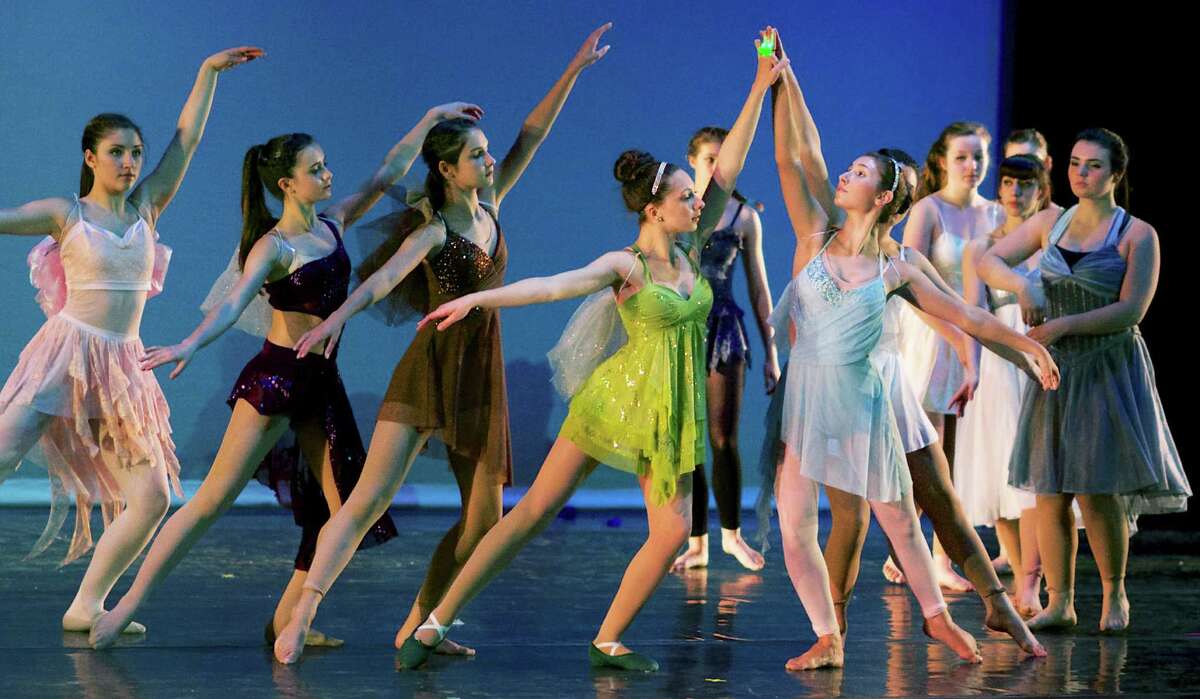 "The Sisters Must Separate," choreographed by Rebecca Anderson Darling, is performed by Modern 5 Dance members and alumni including Morgan Melendez (Sherman, age 14), Caroline Johnson (Kent, age 14), Lindsey Johanson (New Milford, age 13), Lea Krebs (Sherman, age 16), Rebecca Johanson (New Milford ,age 16), Zoe Miolla (New Milford, age 16), Jessie Melendez (Sherman, age 16), Maxine Parsons (New Milford, age 20), Alexis Yancoskie (New Milford, age 17) and Juliana Zaharevich (Litchfield, age 14) during final rehearsal for Studio D's gala dance festival at New Milford High School, May 31, 2014