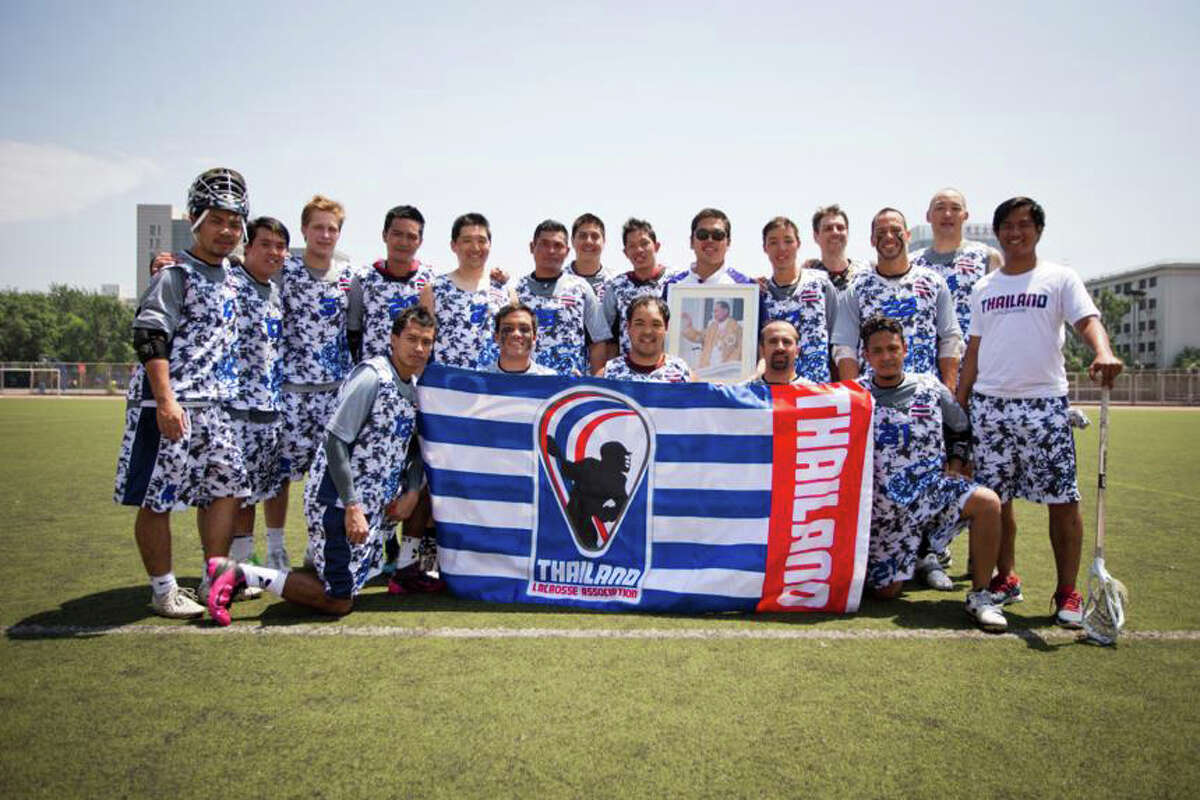 The 2014 Thai national lacrosse team poses before practice in preparation for the 2014 World Lacrosse Championships in Denver, Colo.