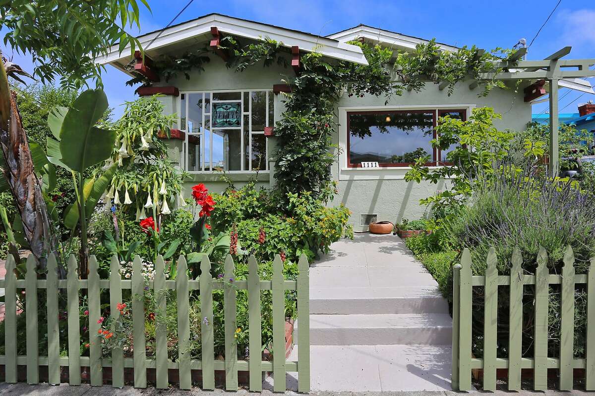 Lush gardens, hardwood finishes in Berkeley Craftsman