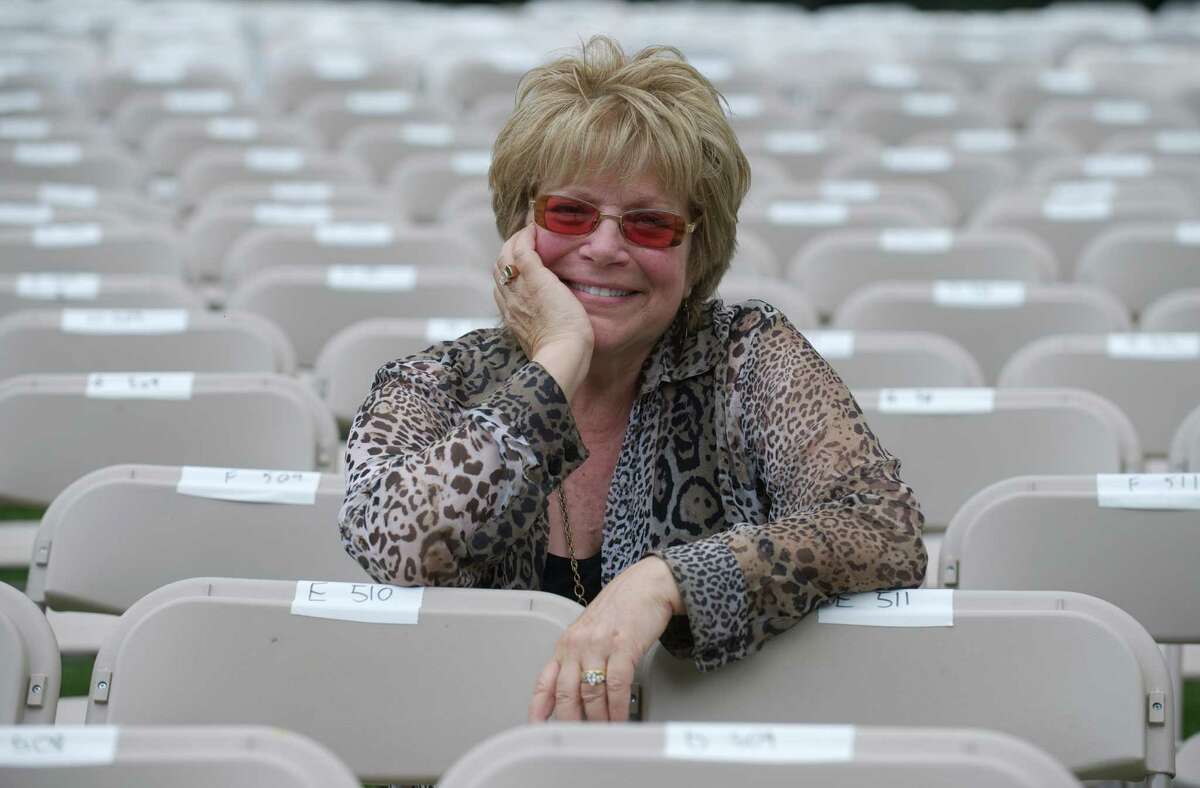 Phyllis Cortese, Executive Director of the Ives Concert Park, sits in the reserve seats, set up for the Peter Frampton concert at the Ives Concert Park, on Tuesday, July 1, 2014. The Ives Concert Park is located on the Westside Campus of Western Connecticut State University, in Danbury, Conn.