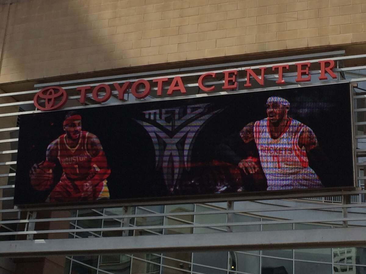 Free-agent Carmelo Anthony is shown in a Rockets uniform on the marquee at Toyota Center on Wednesday.