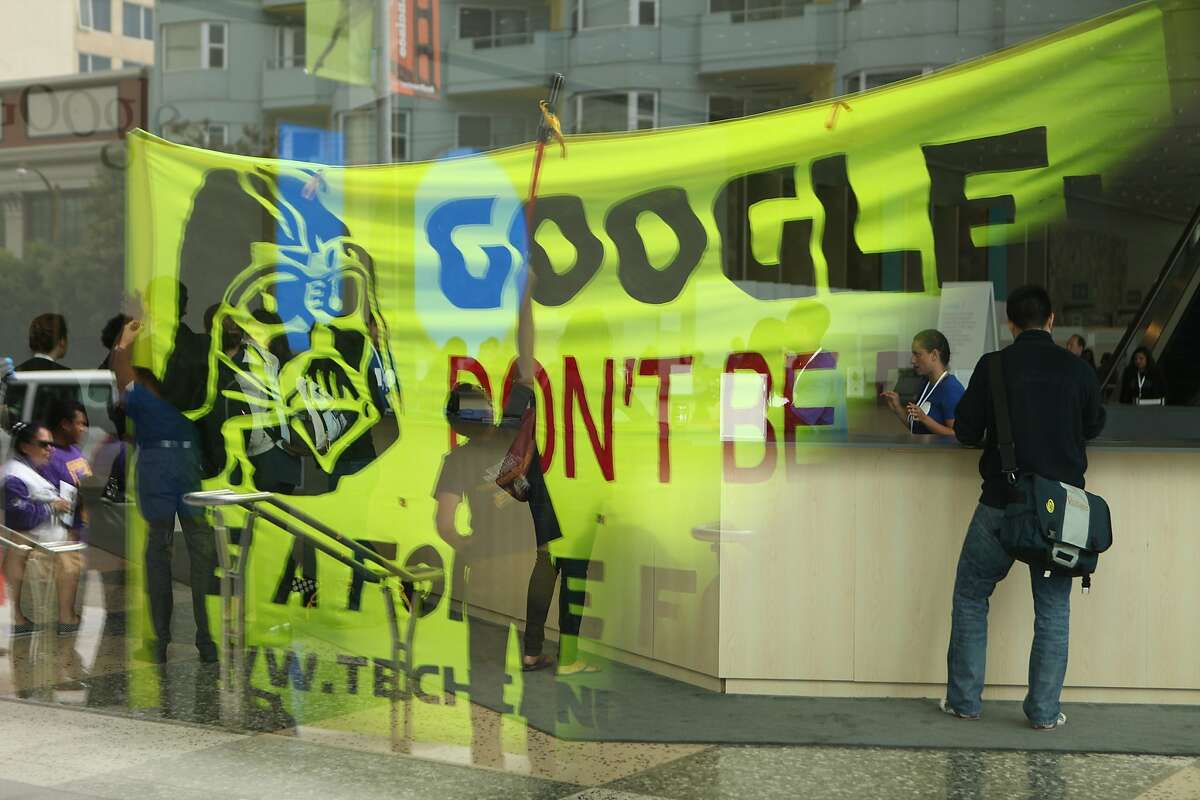 Several groups protest in front of Google I/O at Moscone Center in San Francisco Calif. as attendees check in on Wednesday, June 25, 2014.