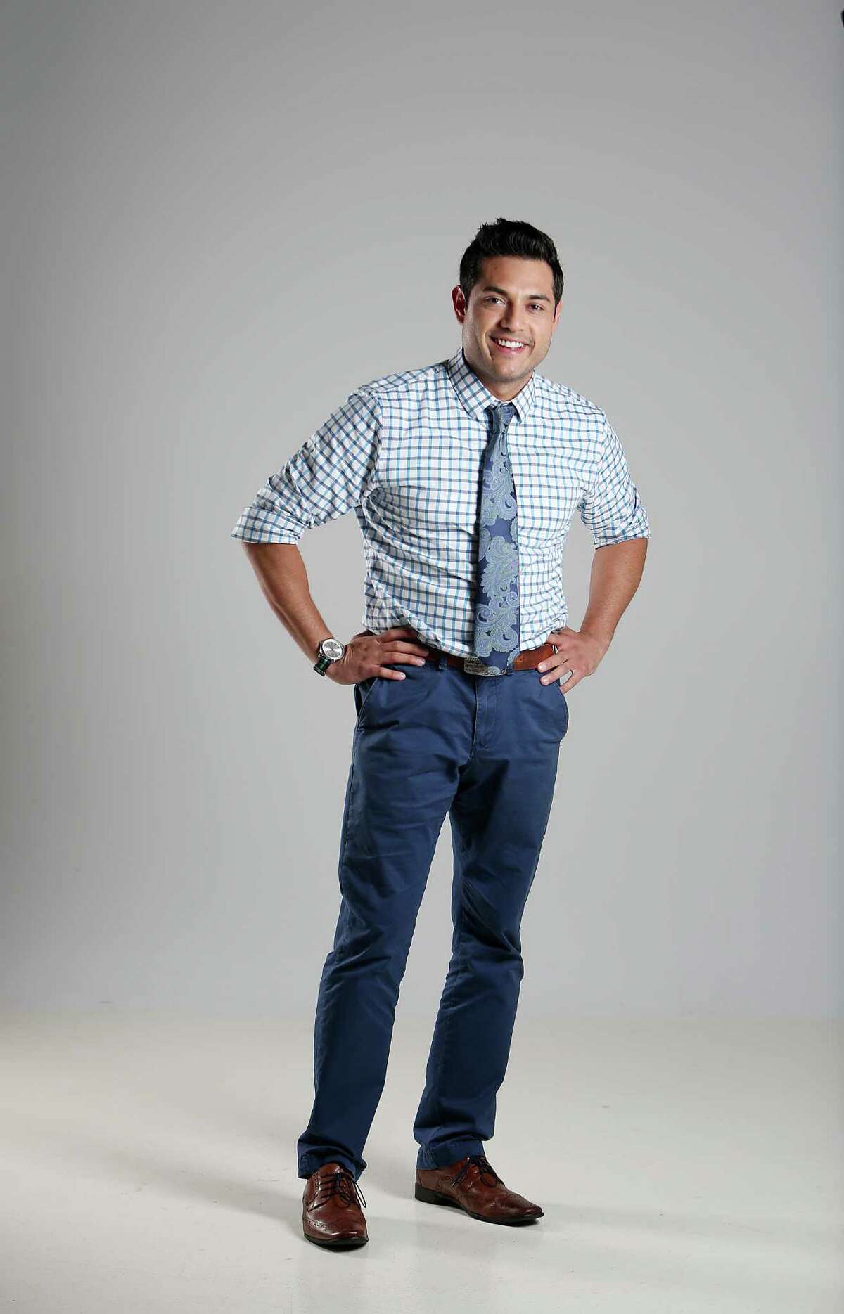 KPRC Ch. 2 TV reporter Phillip Mena is photographed in the Houston Chronicle Studio on June 24, 2014, in Houston, Tx. ( Mayra Beltran / Houston Chronicle )