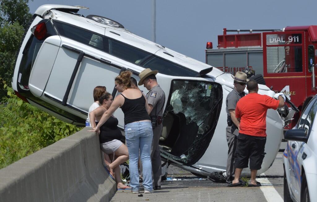 Flipped car ties up Northway traffic
